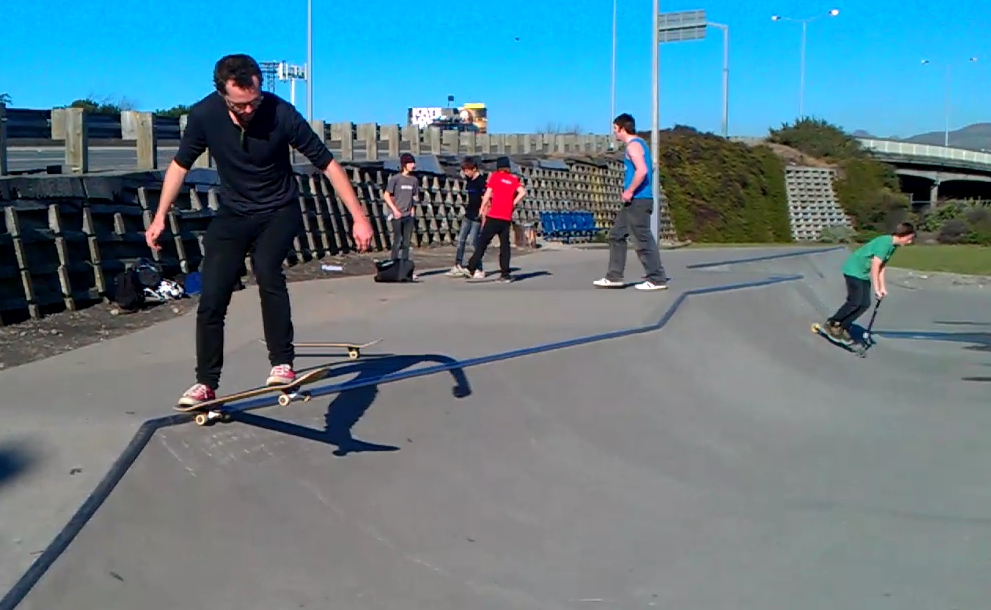 Students teaching me to drop-in on a half-pipe